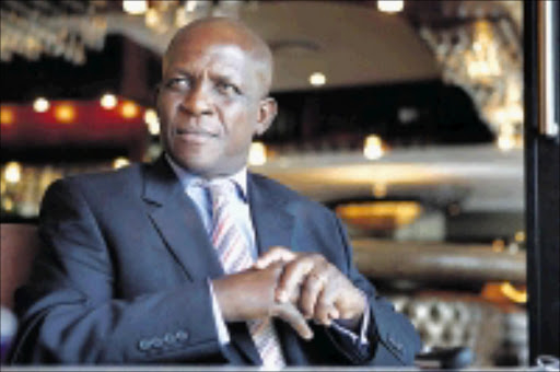 REASSURING: EDI Holdings chairman Duma Nkosi says although there will be a change in employment conditions, no jobs will be lost. 06/03/2009. © The Times. Marianne Schwankhart.