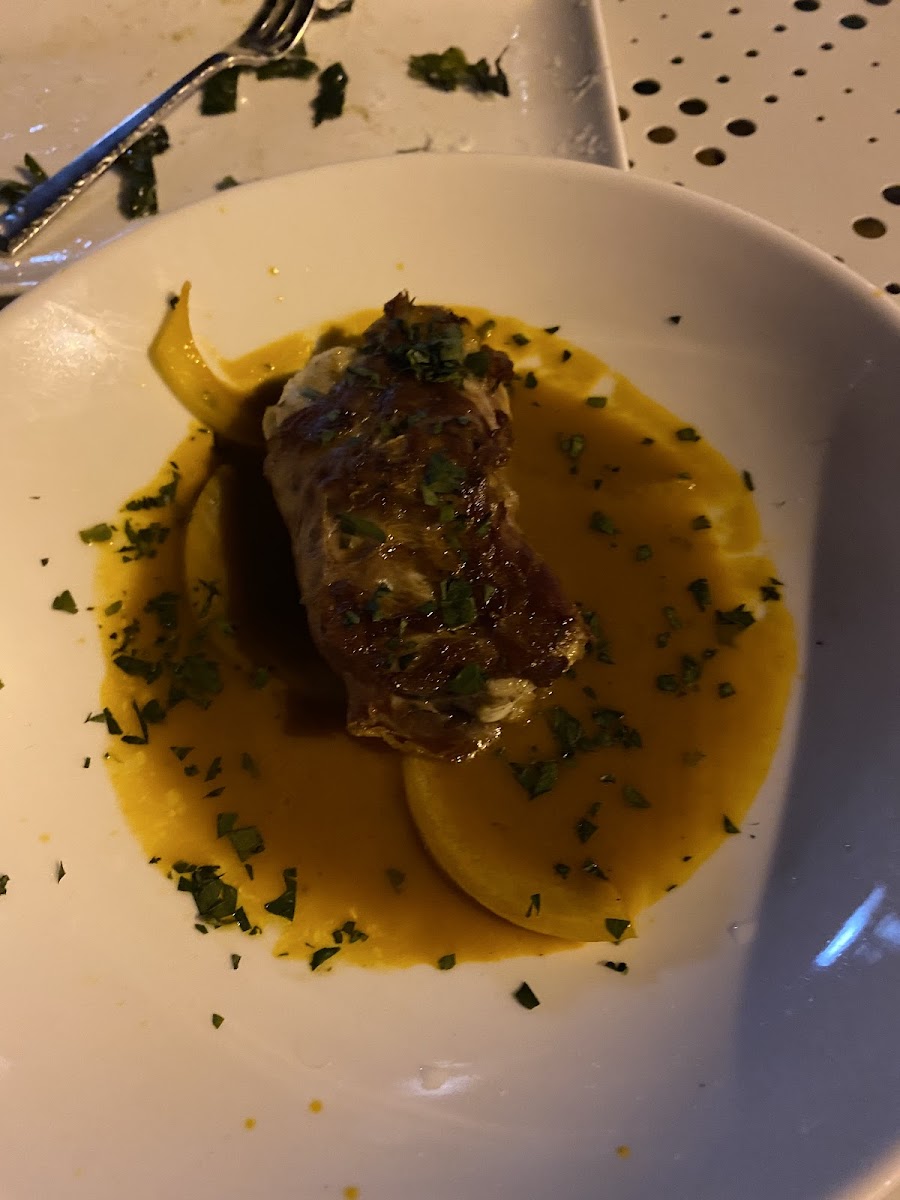 Small piece of fish. With no accompaniment because the chef is not creative enough to make gluten free potatoes gluten free. He woukd ratger serve this. Alone