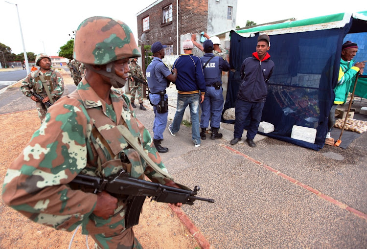Soldiers supporting the police in Lavender Hill on the Cape Flats in August 2011. Now soldiers with peacekeeping experience in the Sudan and DRC have been deployed. File photo.