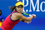 Emma Raducanu of Britain hits a backhand against at the 2021 US Open tennis tournament.
