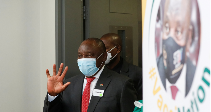 South African President Cyril Ramaphosa gestures as he arrives to receive the Johnson and Johnson coronavirus disease vaccination at Khayelitsha Hospital near Cape Town, South Africa, on February 17, 2021.