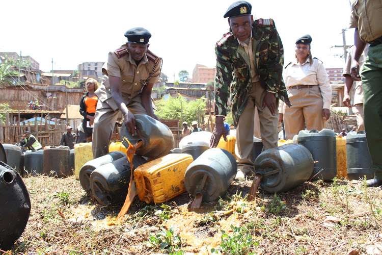 Regional administrators destroy illicit brew in Nyamira South in July 2020