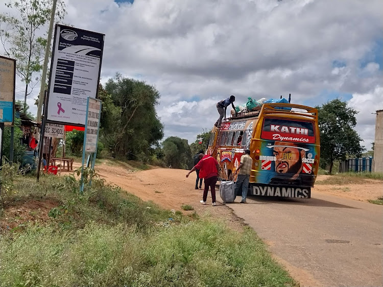 Passengers board a PSV vehicle along Wamunyu - Kalawa road at Mwala, Machakos County on April 1, 2024.