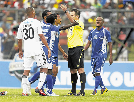 Top referee Daniel Bennett sends players away during last year's Telkom Knockout semifinal between Maritzburg United and Orlando Pirates. Bennett was omitted from this season's referees' list because he failed a fitness test
