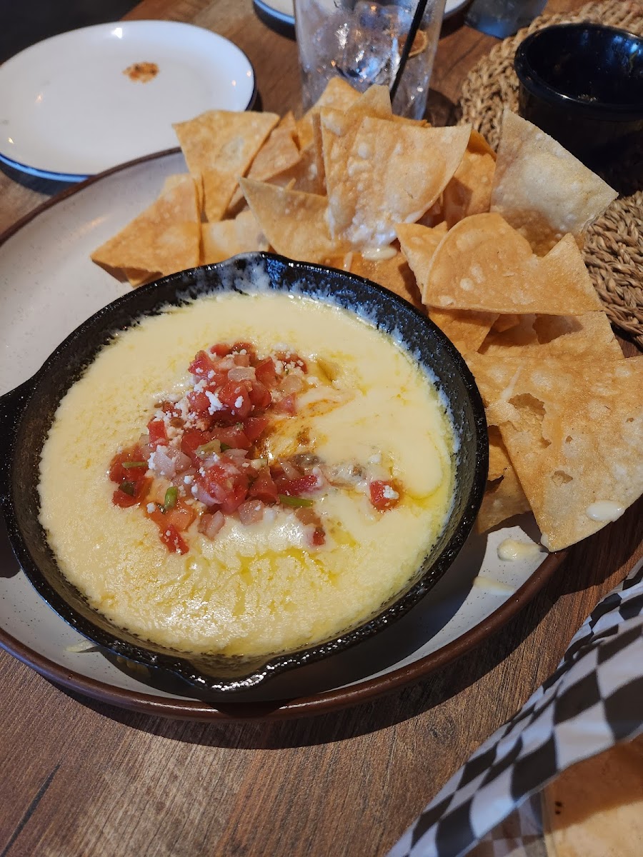 Queso dip comes with a meat choice, corn chios, and corn tortollas.  Delicious!