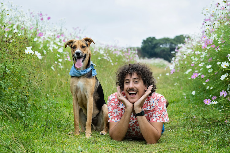 Comedian Schalk Bezuidenhout with his canine companion.