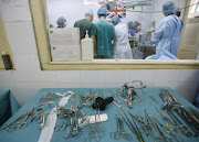 Doctors operate at the Vietnam Cuba Hospital in Hanoi. A study has shown that half of the deaths that occur within 30 days of surgery are in low- and middle-income countries.