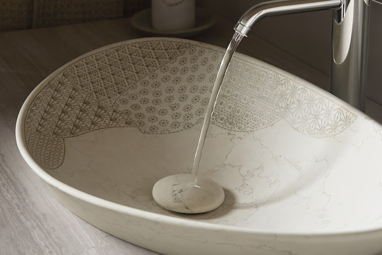Kohler Kensho Trough Vessel Basin with its organic form and Japanese inspired etched motif.