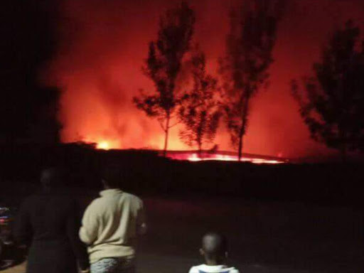 A photo of Kisii dormitory on fire. /COURTESY