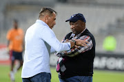 Platinum Stars head coach Roger De Sa and Jomo Cosmos head coach Jomo Sono during the National First Division Promotion and Relegation Playoff match between Platinum Stars and Jomo Cosmos at Vosloorus Stadium on May 23, 2018 in Rustenburg, South Africa. 