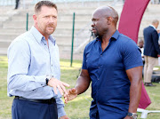 Steve Komphela of Golden Arrows and Eric Tinkler of Maritzburg United during the Absa Premiership match between Golden Arrows and Maritzburg United at Sugar Ray Xulu Stadium on August 04, 2019 in Durban, South Africa. 