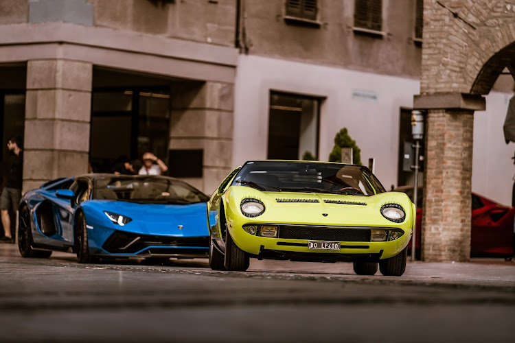 Lamborghini Muira (right) and the Aventador represent the first and latest decade of the brand's 60-year legacy. Picture: SUPPLIED