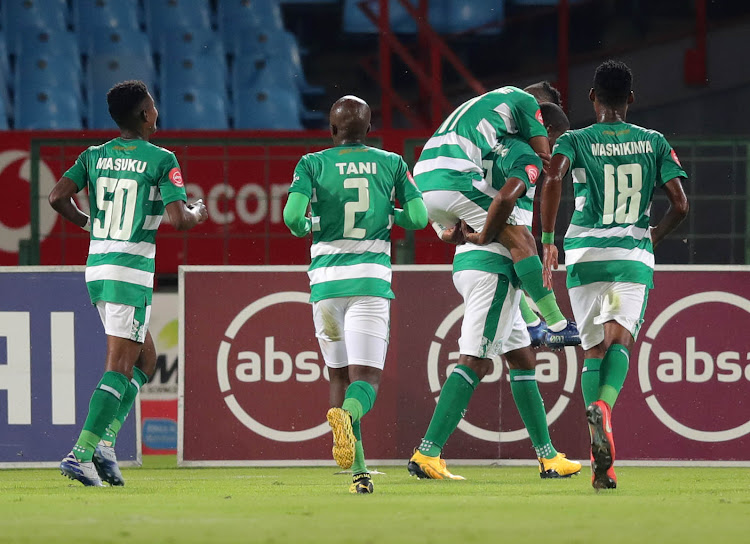 Bloemfontein Celtic captain Ndumiso Mabena celebrates with his teammates after scoring the equalising goal before his Mamelodi Sundowns counterpart Hlompho Kekana scored the winning goal.