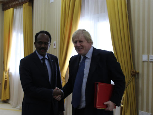 Britain's Secretary of State for Foreign and Commonwealth Affairs Boris Johnson during a meeting with Somalia President Mohamed Abdullahi Farmaajo at Villa Somalia on Wednesday, March 15, 2017. /COURTESY