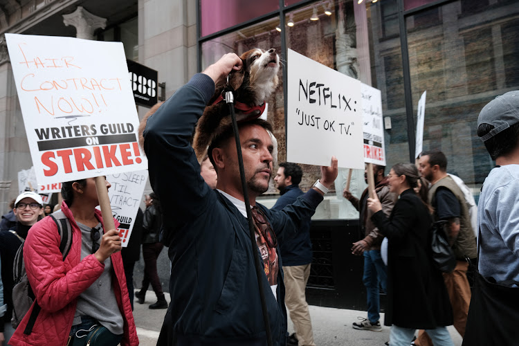 Members of the Writers Guild of America picket outside the New York office of Netflix. Picture: SPENCER PLATT/GETTY IMAGES