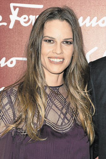 LOOKING GLAM: Hilary Swank attends an art exhibition at the Louvre in Paris in March.