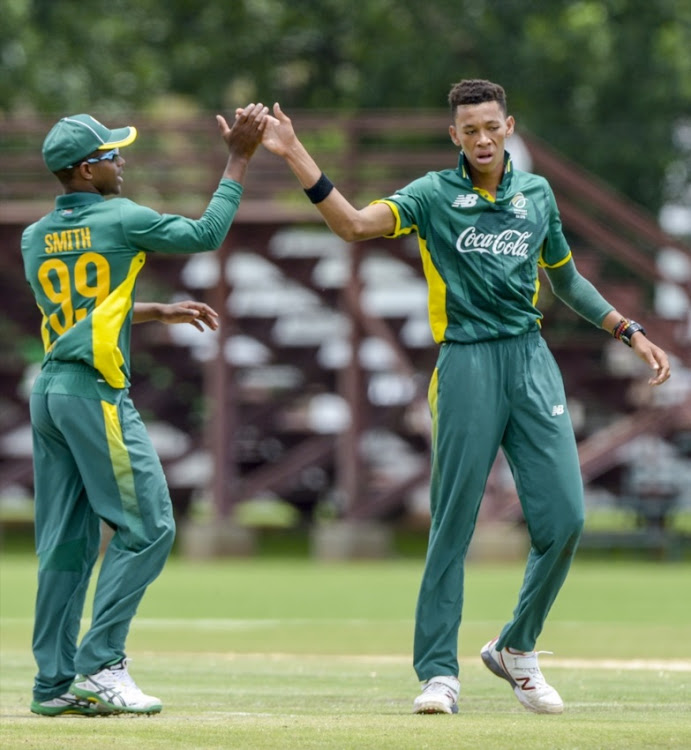 Thando Ntini, right, of South Africa celebrates with teammates during the U/19 Tri Series match between South Africa and Namibia.