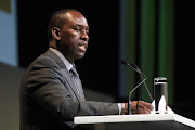 Mosebenzi Zwane, South Africa's mineral resources minister, speaks on the opening day of the Investing in African Mining Indaba in Cape Town, South Africa, on Monday, Feb. 8, 2016