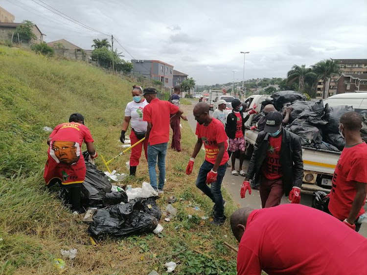 EFF members clean up parts of Overport in Durban as part of their Andries Tatane initiative to create awareness about the importance of clean communities.