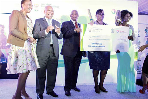 SWEET SUCCESS: Right, export category and overall winner Jenecia Janse with, from left, Nyameka Makonya of Total SA, Limpopo premier Chupu Mathabatha and Department of Agriculture, Forestry and Fisheries director-general Mzamo Mlengana