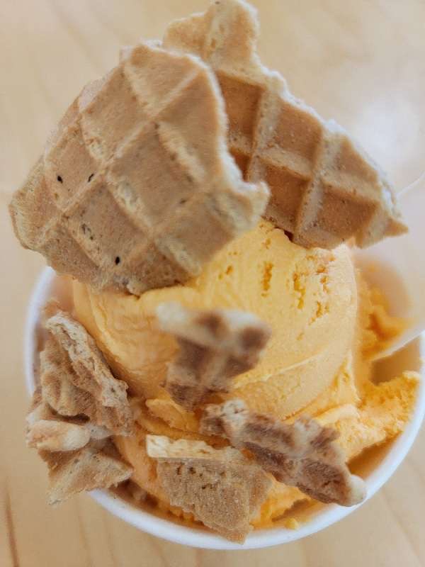 Orange creamsicle with wafflecone bits