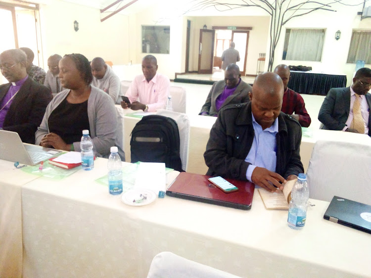 Members of the NCCK follow a meeting at Jumuiya Conference and Country Home in Limuru on Thursday