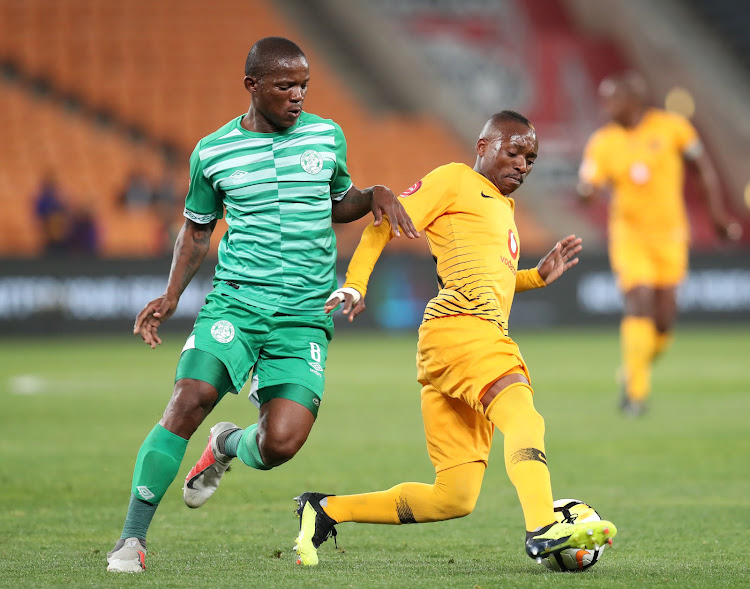 Bloemfontein Celtic midfielder Lantshene Phalane (L) fights for the ball with Kaizer Chiefs star forward Khama Billiat (R) during the Absa Premiership match at FNB Stadium in Johannesburg on August 29 2018.