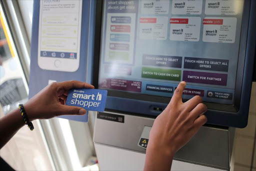 A Pick n Pay smart shopper kiosk is used in Parktown, Johannesburg. South Africans are found to be taking full advantage of loyalty programmes by retail companies. Picture: Alaister Russell