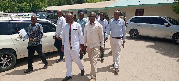 Labor PS Shadrack Mwadime with Garissa county commissioner Mohamed Mwabudzo and other senior officials from the ministry after a courtesy call to the commissioner's office