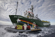A handout photo released by Greenpeace shows the Greenpeace ship Arctic Sunrise entering the Northern Sea Route (NSR) off Russia's coastline to protest against Arctic oil drilling on August 24, 2013. Greenpeace has deployed its icebreaker through an Arctic shipping route to protest against oil drilling in the fragile ecosystem, defying Russian authorities, the group said on August 24, 2013.