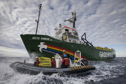 A handout photo released by Greenpeace shows the Greenpeace ship Arctic Sunrise entering the Northern Sea Route (NSR) off Russia's coastline to protest against Arctic oil drilling on August 24, 2013. Greenpeace has deployed its icebreaker through an Arctic shipping route to protest against oil drilling in the fragile ecosystem, defying Russian authorities, the group said on August 24, 2013.