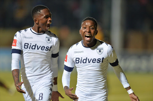 Elias Pelembe of Wits celebrates his goal with Thabang Monare during the Absa Premiership match between Bidvest Wits and Kaizer Chiefs at Bidvest Stadium on August 23, 2016 in Johannesburg, South Africa. (Photo by Lefty Shivambu/Gallo Images)