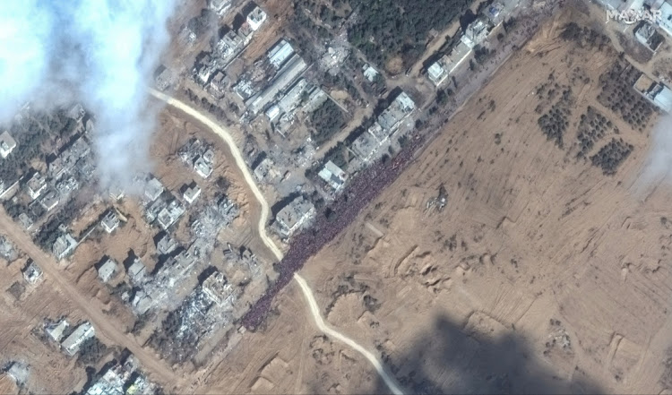 A satellite image shows an overview of people waiting to evacuate, near Gaza City, in Gaza, on November 17. Picture: MAXAR TECHNOLOGIES/HANDOUT via REUTERS