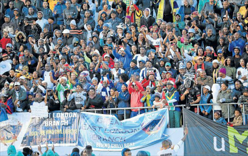 HIGH SPIRITS: Chippa United supporters celebrating their 1-0 victory over Kaizer Chiefs during the Premier’s Cup at Sisa Dukashe Stadium in Mdantsane in July Picture: SINO MAJANGAZA