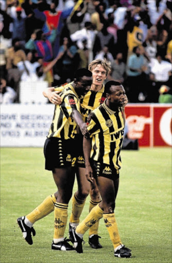 HAPPY SOULMATES: Kaizer Chiefs defender Rudolph Seale is congratulated by teammates after scoring. Photo: Gallo Images