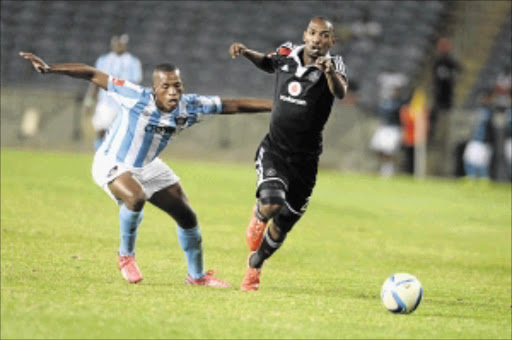 TRICKSTER: Siyabonga Zulu of Chippa United tries in vain to stop trickey Thabo Rakhale of Orlando Pirates during an Absa Premiership game at Orlando Stadium on Tuesday night. Bucs won the match 1-0 and they host Revenue Authority FC in the Champions League on Saturdayphoto: Lefty Shivambu/Gallo