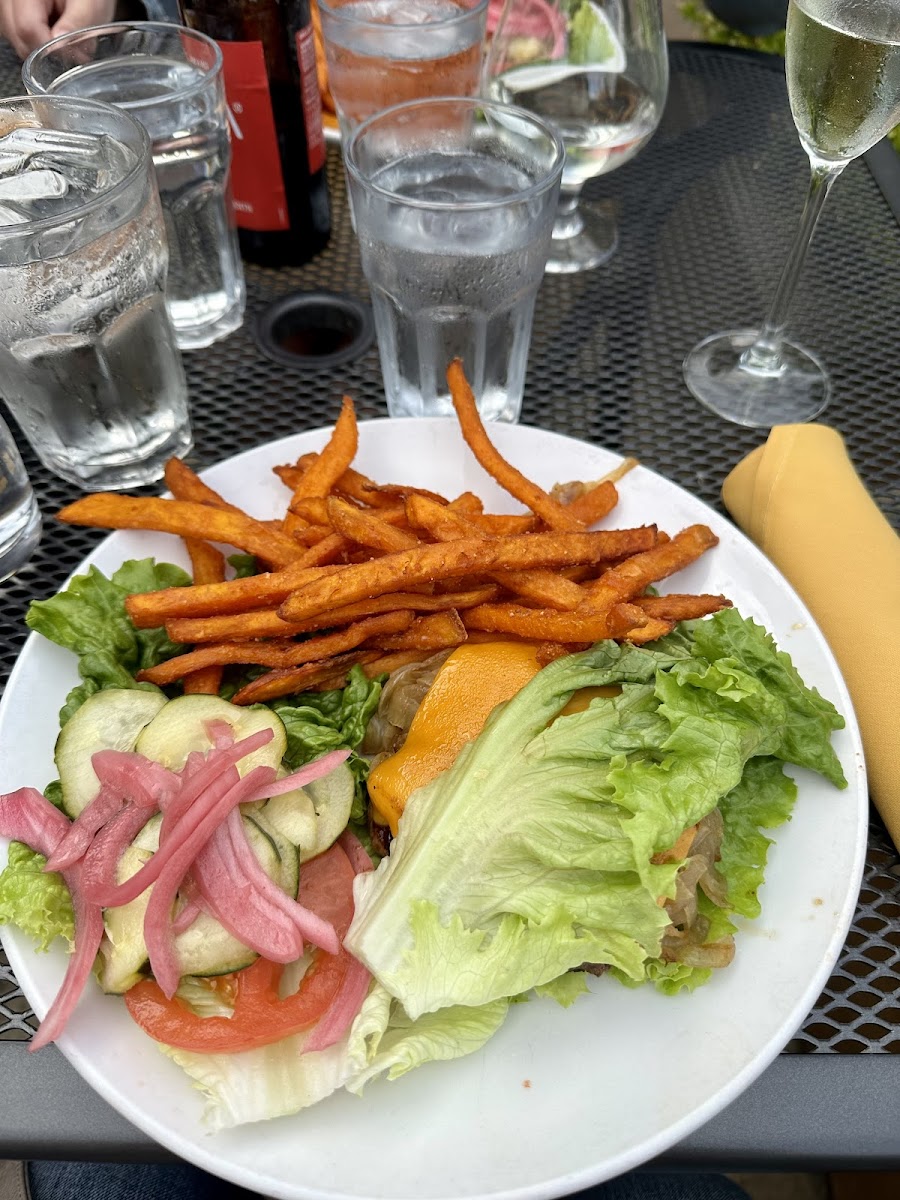 Burger, side pickled vegetables and sweet potato fries