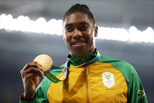 Gold medalist Caster Semenya of South Africa stands on the podium during the medal ceremony for the Women's 800 meter on Day 15 of the Rio 2016 Olympic Games at the Olympic Stadium on August 20, 2016 in Rio de Janeiro, Brazil. (Photo by Patrick Smith/Getty Images)