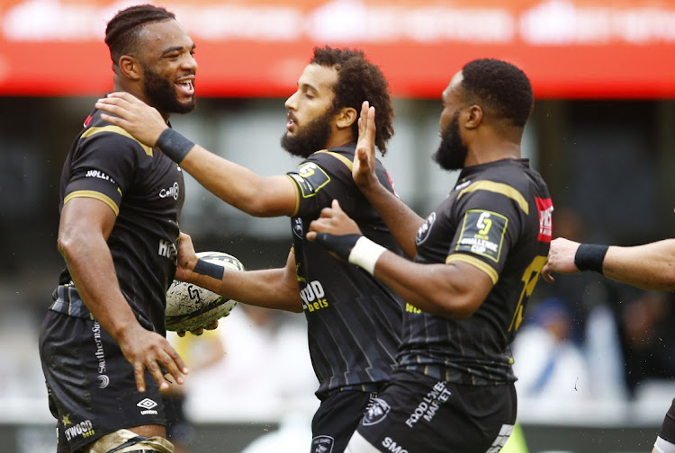 Vincent Tshituka of the Sharks celebrates his try with teammates in the EPCR Challenge Cup round of 16 match against Zebre Parma at Kings Park on Sunday.