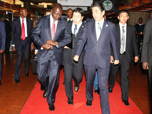 Deputy President William Ruto with Japan Prime Minister Shinzo Abe at KICC, August 26, 2017 /CHARLES KIMANI
