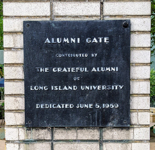 ALUMNI GATE   CONTRIBUTED BY THE GRATEFUL ALUMNI OFLONG ISLAND UNIVERSITY   DEDICATED JUNE 5, 1959
