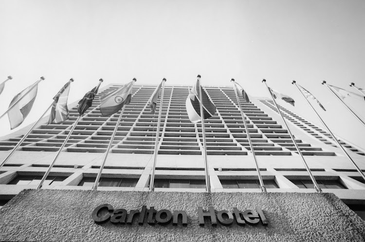 The exterior of the Carlton Hotel in the Central Business District of Johannesburg. Circa 1990s.