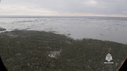 A view from a helicopter shows a flooded area in the Kurgan Region, Russia, in this still image taken from video released April 9, 2024. 