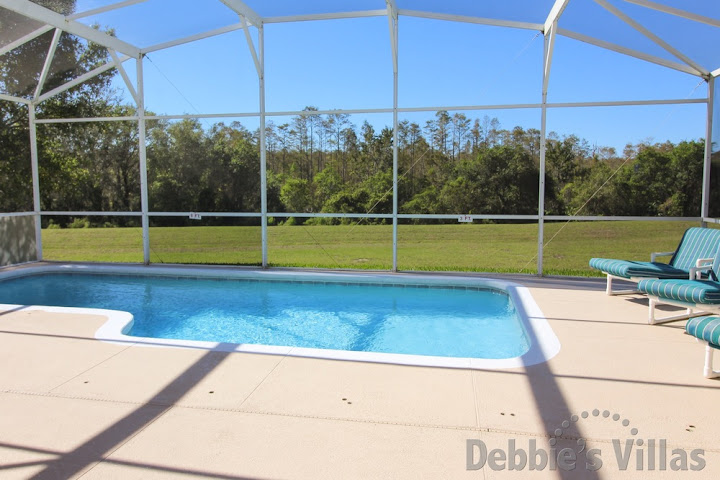 Inviting west-facing private pool with conservation view on Highlands Reserve
