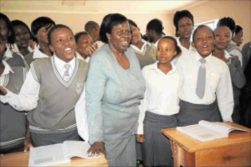 JOVIAL MOOD: Deputy Minister of Water and Environmental Affairs Rejoice Mabudafhasi during the handover of desks at Boitumelo High School in Meqheleng township in Ficksburg, Free State, yesterday. Photo: Tsheko Kabasia