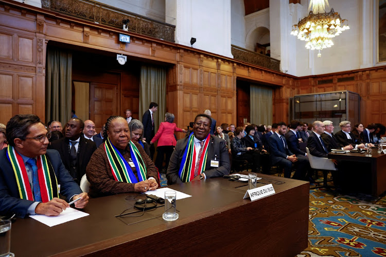 International relations and co-operation director-general Zane Dangor, minister Naledi Pandor and South African ambassador to the Netherlands Vusimuzi Madonsela at the ICJ on Friday.