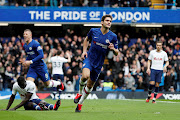 Jorginho celebrates after scoring during the London derby against Tottenham. 