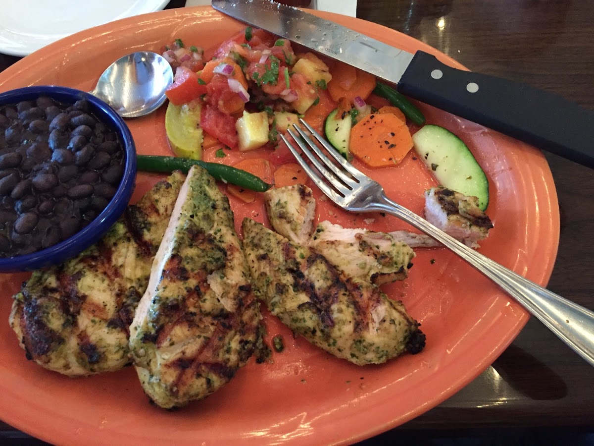 Grilled Chicken, black beans, fresh steamed veggies and pineapple salsa.