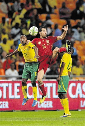 UP HIGH: Sergio Busquets of Spain wins the header during the international friendly match against South Africa yesterday. Photo: Duif du Toit/Gallo Images