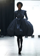  A model walks the runway at the Romeo Hunte fashion show during New York Fashion Week. 
